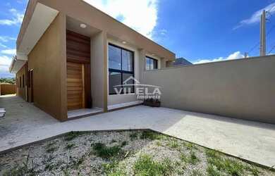 Imagem: A casa possui 3 Dormitórios, 2 Banheiros, 5 Vagas na garagem