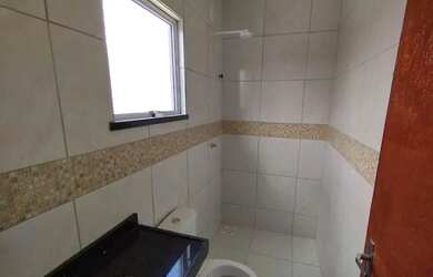 Imagem: A casa possui 3 Dormitórios, 2 Banheiros, 3 Vagas na garagem