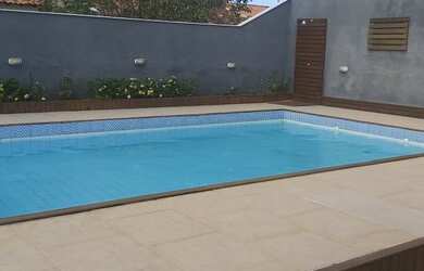 Imagem: A casa em condomínio possui 4 Dormitórios, 5 Banheiros, 5