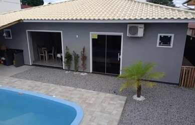 Imagem: A casa possui 2 Dormitórios, 1 Banheiro, 2 Vagas na garagem