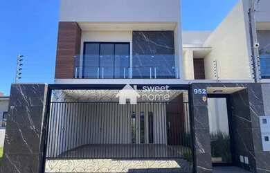 Imagem: A casa possui 3 Dormitórios, 3 Banheiros, 2 Vagas na garagem