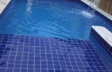 Imagem: A casa possui 3 Dormitórios, 2 Vagas na garagem e está localizado