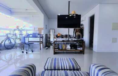 Imagem: O apartamento possui 1 Dormitório, 1 Banheiro, 1 Vaga na garagem