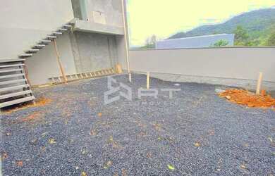 Imagem: A casa possui 3 Dormitórios, 3 Banheiros, 2 Vagas na garagem