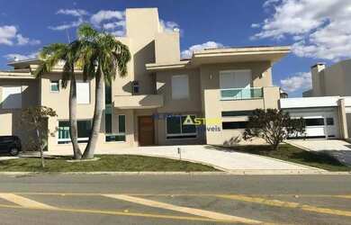 Imagem: A casa em condomínio possui 4 Dormitórios, 5 Banheiros, 5