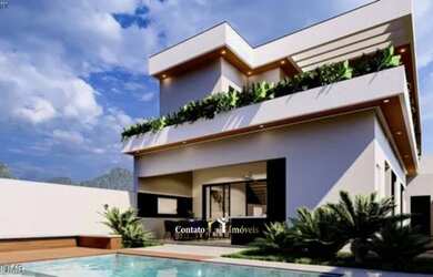 Imagem: A casa em condomínio possui 4 Dormitórios, 5 Banheiros, 2