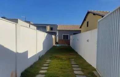 Imagem: A casa possui 2 Dormitórios, 1 Banheiro, 2 Vagas na garagem