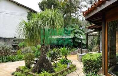 Imagem: A casa possui 5 Dormitórios, 5 Banheiros, 3 Vagas na garagem