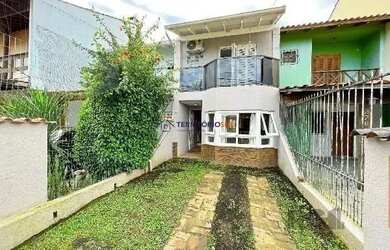 Imagem: A casa possui 2 Dormitórios, 3 Banheiros, 2 Vagas na garagem