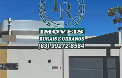 Imagem: A casa possui 3 Dormitórios, 2 Banheiros, 2 Vagas na garagem