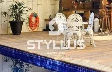 Imagem: A casa possui 2 Dormitórios, 4 Banheiros, 5 Vagas na garagem