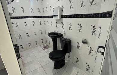 Imagem: A casa possui 2 Dormitórios, 2 Banheiros e está localizado