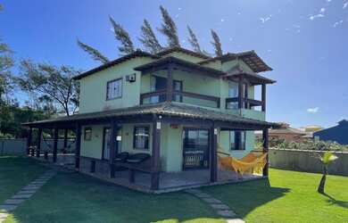 Imagem: A casa possui 5 Dormitórios, 3 Vagas na garagem e está localizado