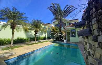 Imagem: A casa em condomínio possui 5 Dormitórios, 5 Banheiros, 2