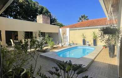 Imagem: A casa em condomínio possui 4 Dormitórios, 3 Banheiros, 3