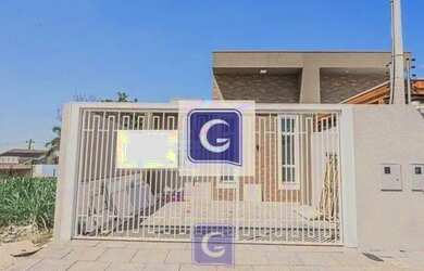 Imagem: A casa possui 3 Dormitórios, 2 Banheiros, 2 Vagas na garagem