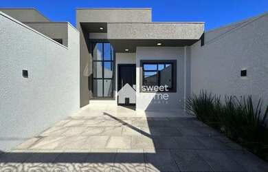 Imagem: A casa possui 2 Dormitórios, 1 Banheiro, 2 Vagas na garagem