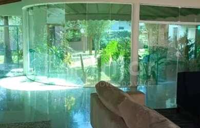 Imagem 2: Linda casa térrea em condomínio com 4 suítes todas com closet e 2 delas...