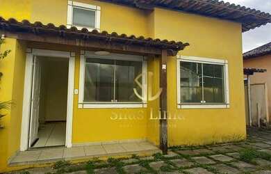 Imagem: A casa possui 2 Dormitórios, 1 Banheiro, 2 Vagas na garagem