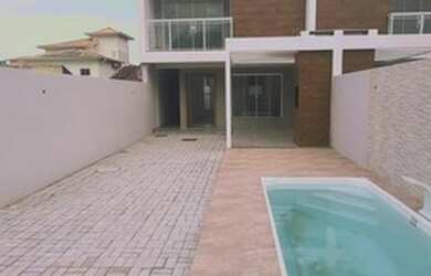 Imagem: A casa possui 3 Dormitórios, 4 Banheiros, 2 Vagas na garagem