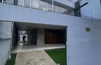 Imagem: A casa possui 4 Dormitórios, 5 Banheiros, 5 Vagas na garagem