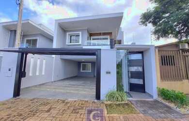 Imagem: A casa possui 4 Dormitórios, 3 Banheiros, 4 Vagas na garagem