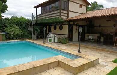 Imagem: A casa em condomínio possui 4 Dormitórios, 3 Banheiros, 2