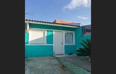 Imagem: A casa possui 2 Dormitórios, 1 Banheiro, 1 Vaga na garagem