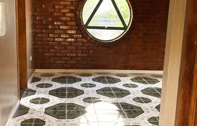 Imagem: A casa possui 3 Dormitórios, 2 Banheiros e está localizado