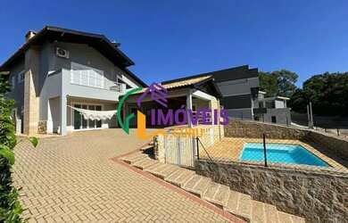 Imagem: A casa em condomínio possui 3 Dormitórios, 4 Banheiros, 2