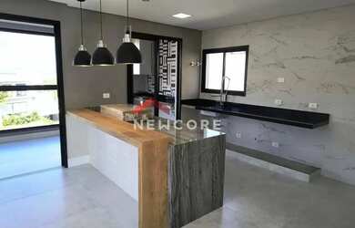 Imagem: A casa em condomínio à venda possui 3 Dormitórios, 5 Banheiros