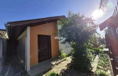 Imagem: A casa possui 5 Dormitórios, 2 Banheiros, 2 Vagas na garagem