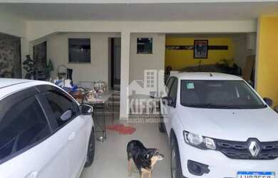 Imagem: A casa possui 5 Dormitórios, 5 Banheiros, 4 Vagas na garagem