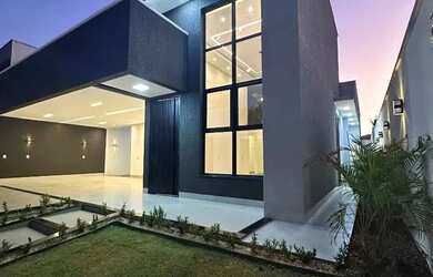 Imagem: A casa possui 4 Dormitórios, 5 Banheiros, 4 Vagas na garagem