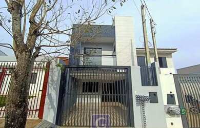 Imagem: A casa possui 3 Dormitórios, 3 Banheiros, 2 Vagas na garagem