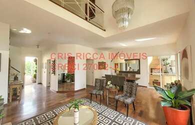 Imagem: A casa em condomínio possui 4 Dormitórios, 5 Banheiros, 3