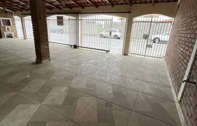 Imagem: A casa possui 5 Dormitórios, 4 Banheiros, 3 Vagas na garagem