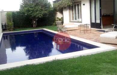 Imagem: A casa em condomínio possui 4 Dormitórios, 4 Banheiros, 550m²