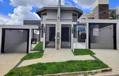 Imagem: A casa possui 3 Dormitórios, 1 Banheiro, 2 Vagas na garagem