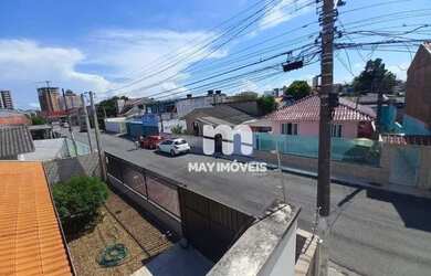 Imagem: A casa possui 3 Dormitórios, 1 Banheiro, 2 Vagas na garagem