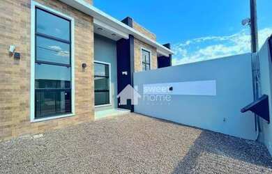 Imagem: A casa possui 3 Dormitórios, 1 Banheiro, 2 Vagas na garagem