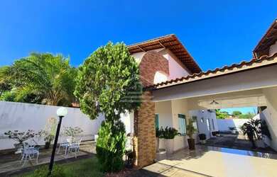 Imagem: A casa possui 4 Dormitórios, 5 Banheiros, 5 Vagas na garagem