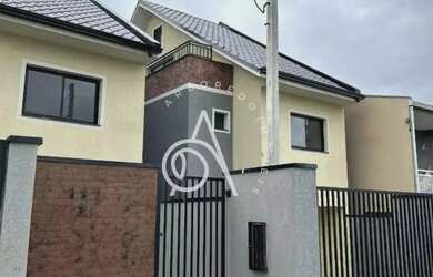 Imagem: A casa possui 3 Dormitórios, 3 Banheiros, 2 Vagas na garagem