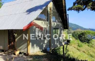 Imagem: A casa possui 1 Dormitório, 1 Banheiro, 2 Vagas na garagem