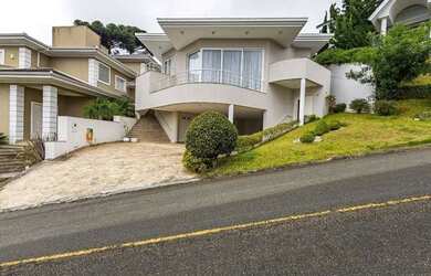 Imagem: A casa em condomínio possui 4 Dormitórios, 5 Banheiros, 5