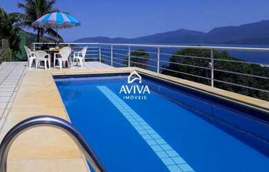 Imagem: A casa em condomínio à venda possui 4 Dormitórios, 5 Banheiros