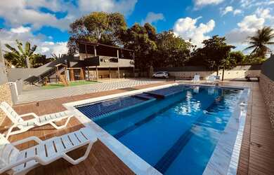 Imagem: A casa possui 5 Dormitórios, 5 Banheiros, 5 Vagas na garagem