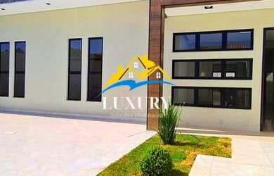 Imagem: A casa possui 4 Dormitórios, 4 Banheiros, 2 Vagas na garagem