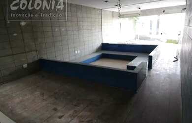 Imagem: A casa possui 3 Dormitórios, 5 Banheiros, 5 Vagas na garagem