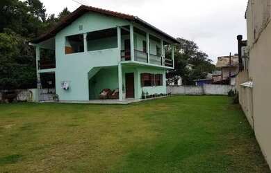 Imagem: A casa à venda possui 5 Dormitórios, 3 Banheiros, 1 Vaga na